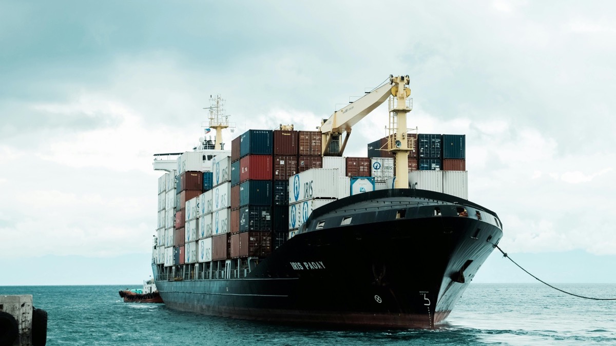 Container ship at sea — global ocean freight by ICTS Logistic