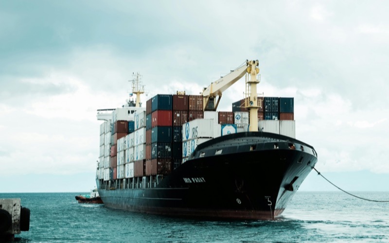 Maersk container ship in port — global sea freight